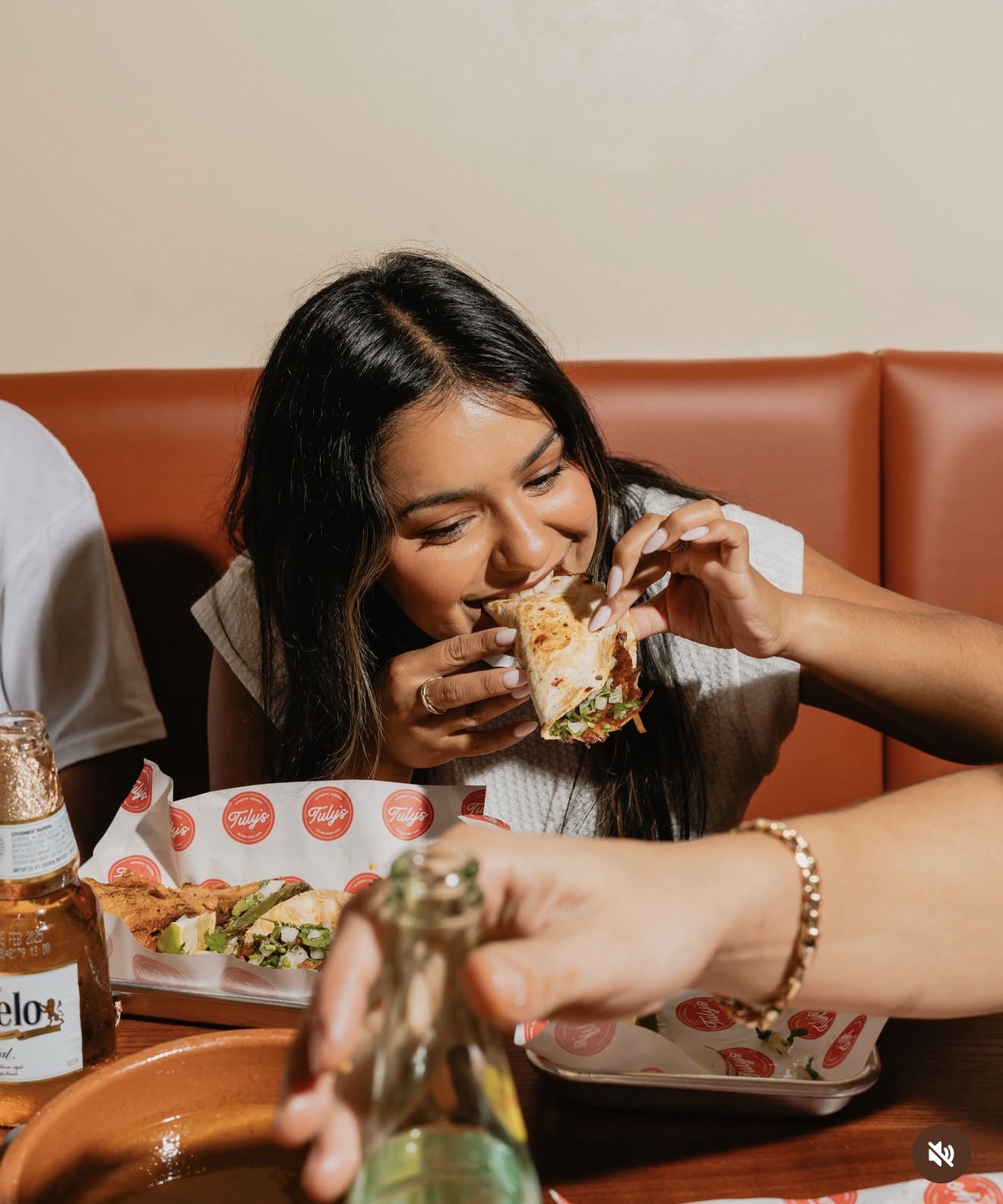 Guest eating at Tuly's Tacos