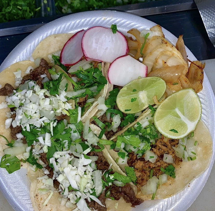 Tacos with grilled onions and peppers